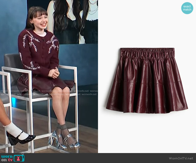 H&M Flared Coated Skirt in Burgundy worn by Violet McGraw on Access Hollywood