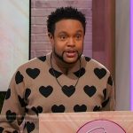 Jawn’s beige heart print sweater on Sherri