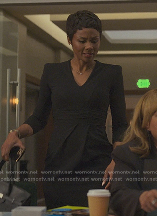 Jax's black padded shoulder dress on Reasonable Doubt