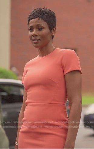 Jax’s orange short sleeve sheath dress on Reasonable Doubt