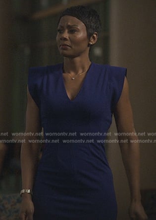 Jax's blue v-neck dress on Reasonable Doubt