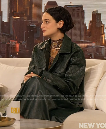 Jenny Slate's green leather jacket and skirt on The Drew Barrymore Show