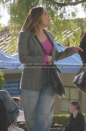 Jo's pink henley top and barrel jeans on Greys Anatomy