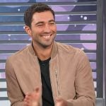 Joey Graziadei’s suede bomber jacket on Access Hollywood