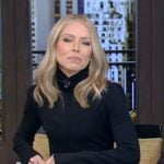 Kelly’s black turtleneck and red skirt on Live with Kelly and Mark