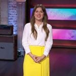 Kelly’s yellow tie waist skirt on The Kelly Clarkson Show