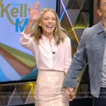 Kelly’s pink blouse and metallic skirt on Live with Kelly and Mark