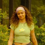 Kiara’s green lemon graphic top and denim shorts on Outer Banks