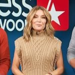 Kit’s beige button shoulder cable knit vest and jeans on Access Hollywood