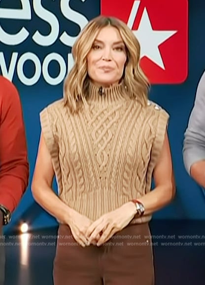 Kit's beige button shoulder cable knit vest and jeans on Access Hollywood