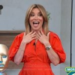 Kit’s red button down mini dress on Access Hollywood