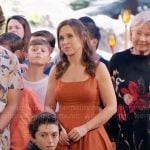 Lacey Chabert’s orange flared midi dress on Celebrations with Lacey Chabert