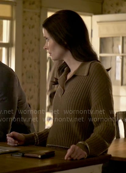 Lois’s brown polo sweater on Superman and Lois