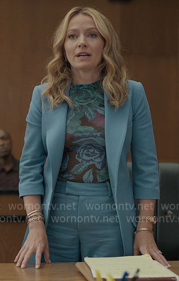 Lorna’s blue suit, floral top, and polka dot bag on The Lincoln Lawyer