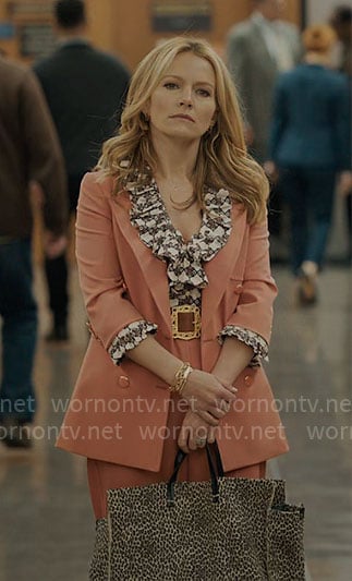 Lorna's coral suit and leopard bag on The Lincoln Lawyer