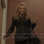 Lorna’s striped suit, leopard pumps, and leather bag on The Lincoln Lawyer