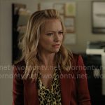 Lorna’s yellow leopard blouse and red satin suit on The Lincoln Lawyer