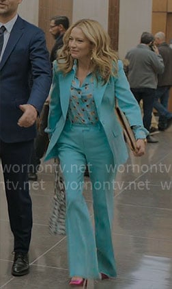 Lorna's turquoise blue suit and pug shirt on The Lincoln Lawyer