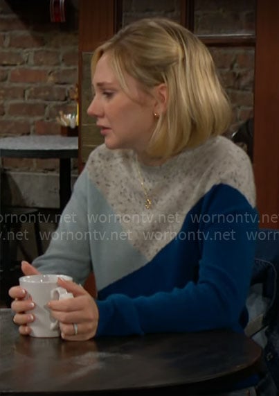 Lucy's blue colorblock sweater on The Young and the Restless