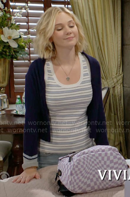 Lucy's striped tank top and purple checked backpack on The Young and the Restless