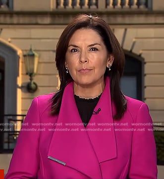 Meg Oliver’s pink wrap coat on CBS Evening News