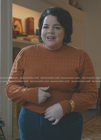 Megan’s orange ribbed sweater on American Horror Stories