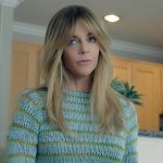 Morgan’s blue and green striped knit sweater on High Potential