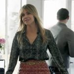 Morgan’s snake print blouse and woven leather skirt on High Potential