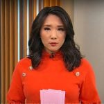 Nancy Chen’s red sweater with gold buttons on CBS Mornings