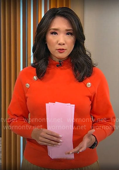 Nancy Chen's red sweater with gold buttons on CBS Mornings