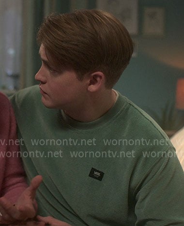 Nick's green corduroy sweatshirt on Heartstopper