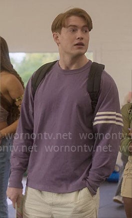 Nick's purple t-shirt with striped sleeve on Heartstopper