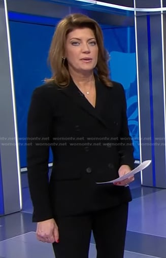 Norah's black double breasted blazer on CBS Evening News