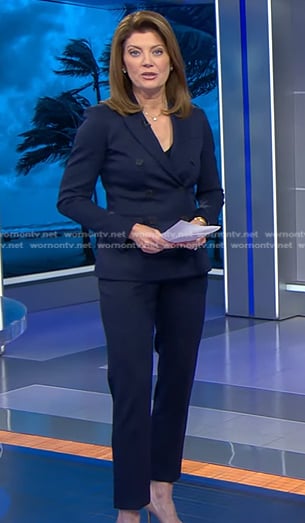 Norah's navy double breasted blazer and pant suit on CBS Evening News