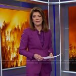 Norah’s purple tie neck blouse and suit on CBS Evening News