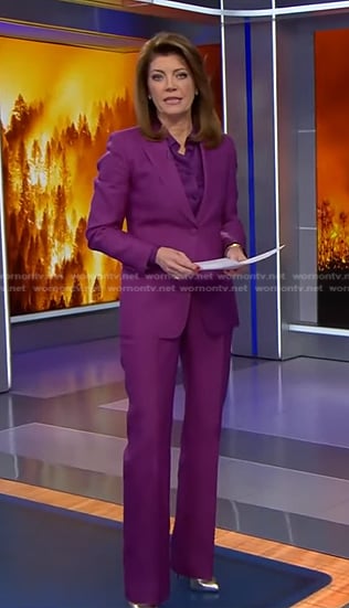 Norah's purple tie neck blouse and suit on CBS Evening News