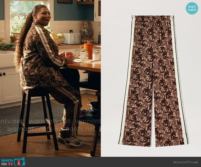 Robyn’s brown printed track pants on The Equalizer