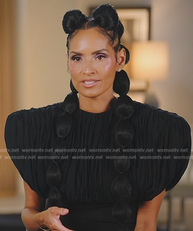 Raquel's black gathered confessional top on The Real Housewives of New York City