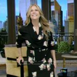 Rita Wilson’s black floral drape neck dress on Live with Kelly and Mark