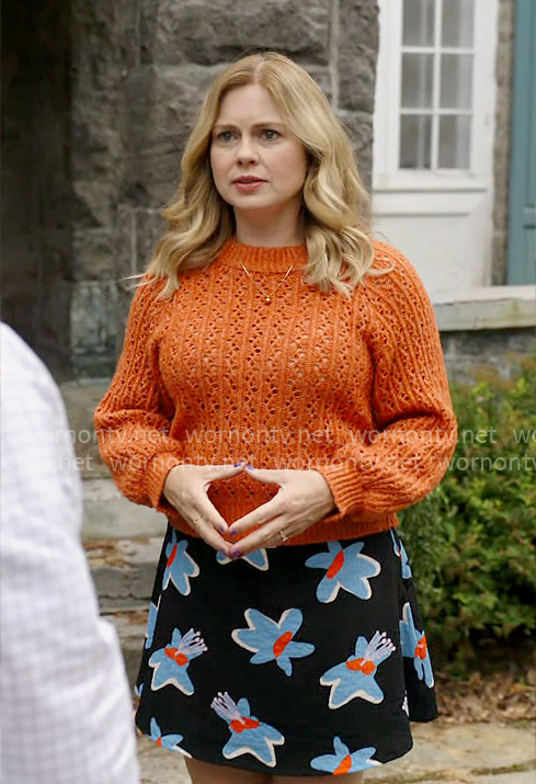 Sam's floral skirt and orange sweater on Ghosts