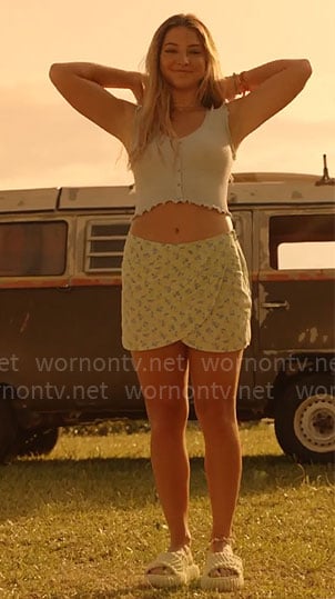 Sarah's blue crop top and mint green floral mini skirt on Outer Banks