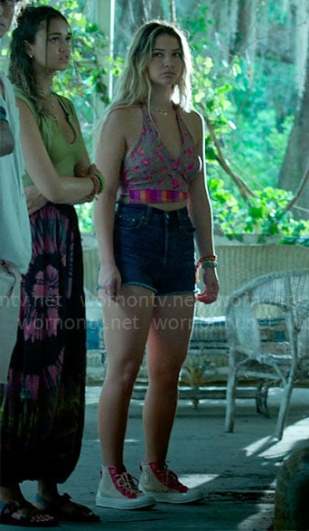 Sarah's floral crop top and high top sneakers on Outer Banks