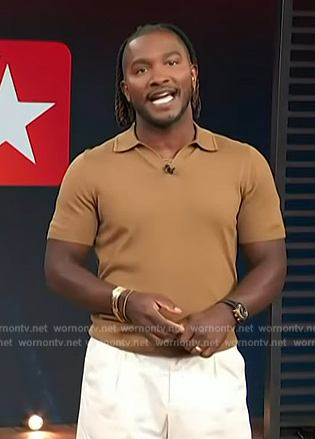 Scott’s brown polo on Access Hollywood