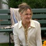 Sharon’s white button down blouse and green leather pants on The Young and the Restless