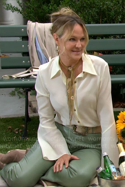 Sharon's white button down blouse and green leather pants on The Young and the Restless