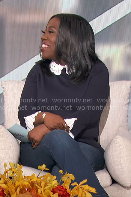 Sheryl's navy sweater with white eyelet collar on The Talk