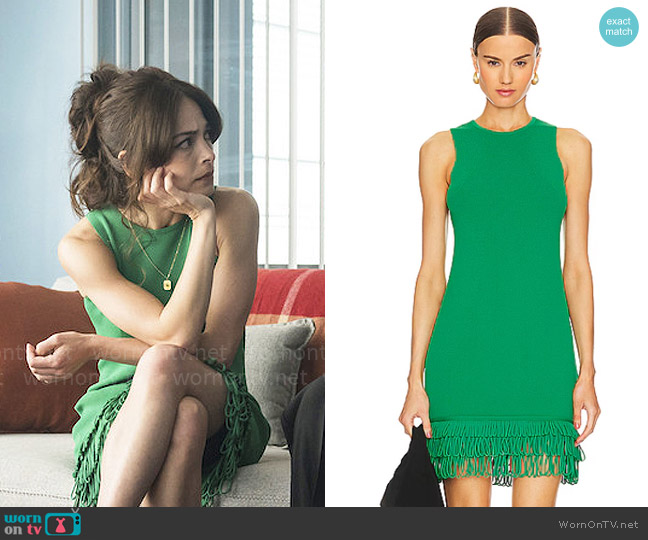 Cassandra’s green fringed dress on Murder in a Small Town