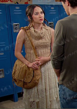 Sophia’s beige sleeveless sweater and lace skirt on Days of our Lives