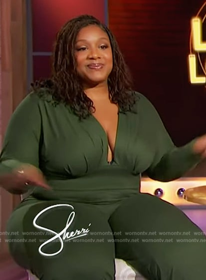 Tacarra Williams’s olive jumpsuit on Sherri