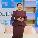 Tamron’s burgundy peplum sweater and skirt on Tamron Hall Show